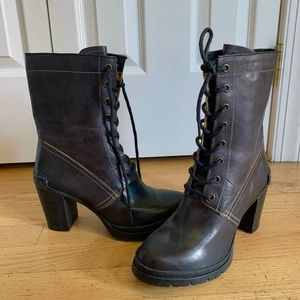 Heeled black lace up boots